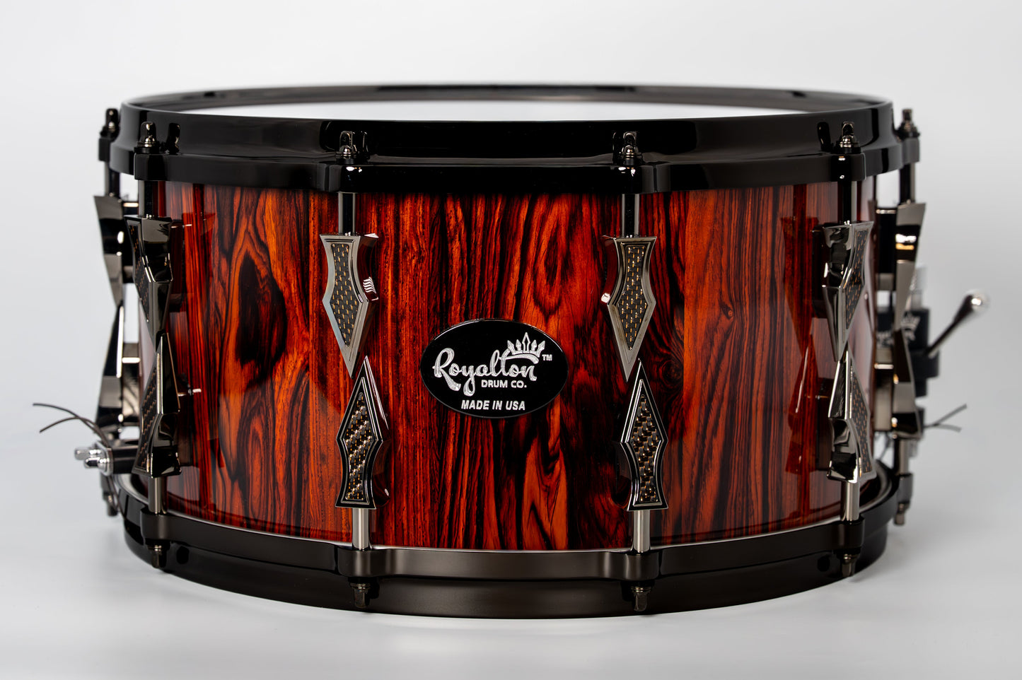 Cocobolo 10 Lug Stave Snare Drum 7.5''x14'' High Gloss Finish with Black Chrome Lugs and Copper Lightning Strike Carbon Fiber Inlays