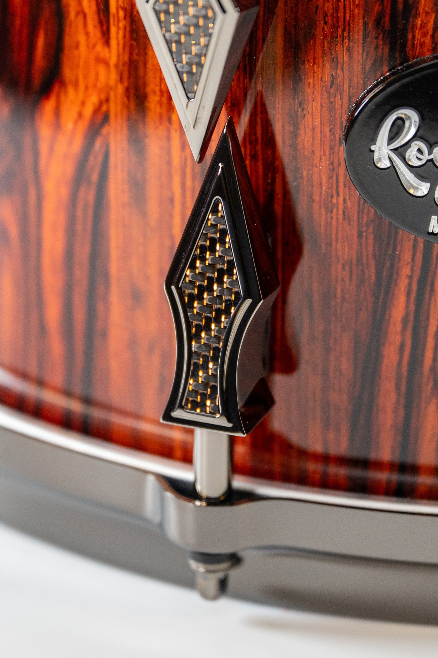 Cocobolo 10 Lug Stave Snare Drum 7.5''x14'' High Gloss Finish with Black Chrome Lugs and Copper Lightning Strike Carbon Fiber Inlays