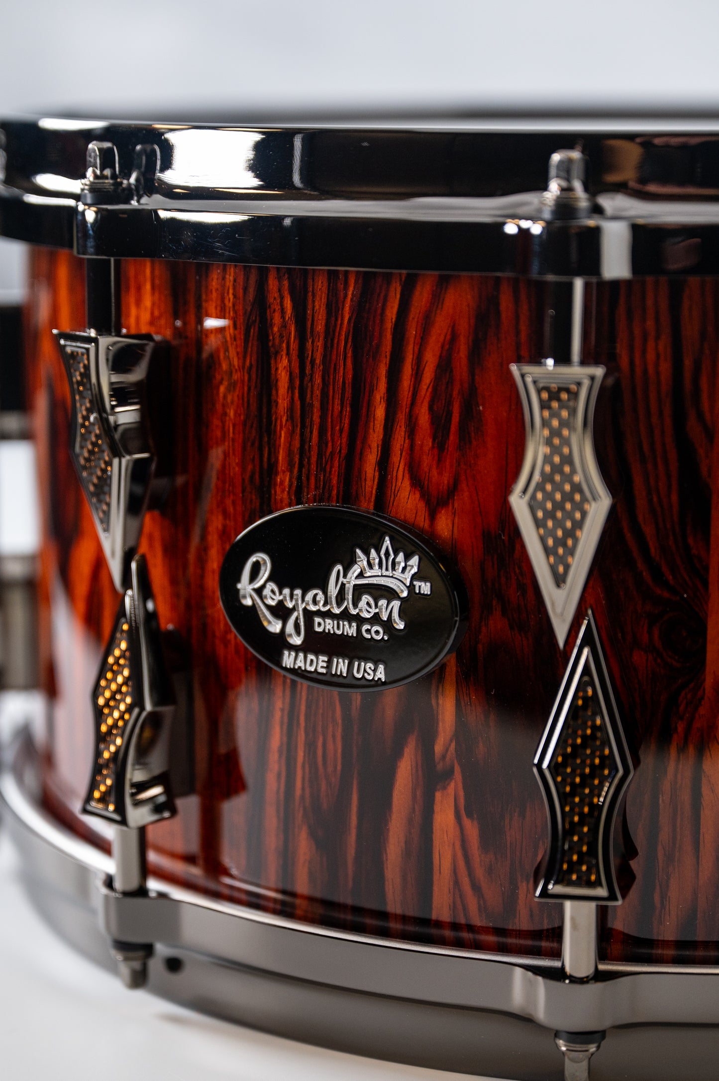 Cocobolo 10 Lug Stave Snare Drum 7.5''x14'' High Gloss Finish with Black Chrome Lugs and Copper Lightning Strike Carbon Fiber Inlays