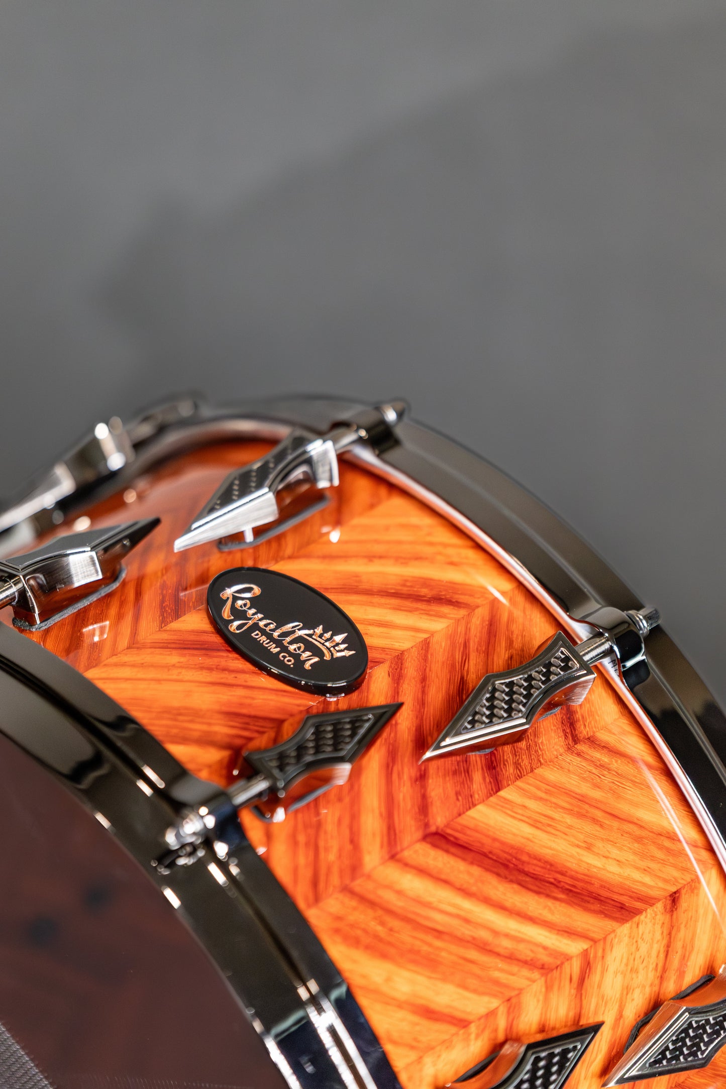 African Padauk Snare 7.5''x14'' High Gloss Finish with Antique Brushed Black Nickel Lugs and Carbon Fiber Inlays