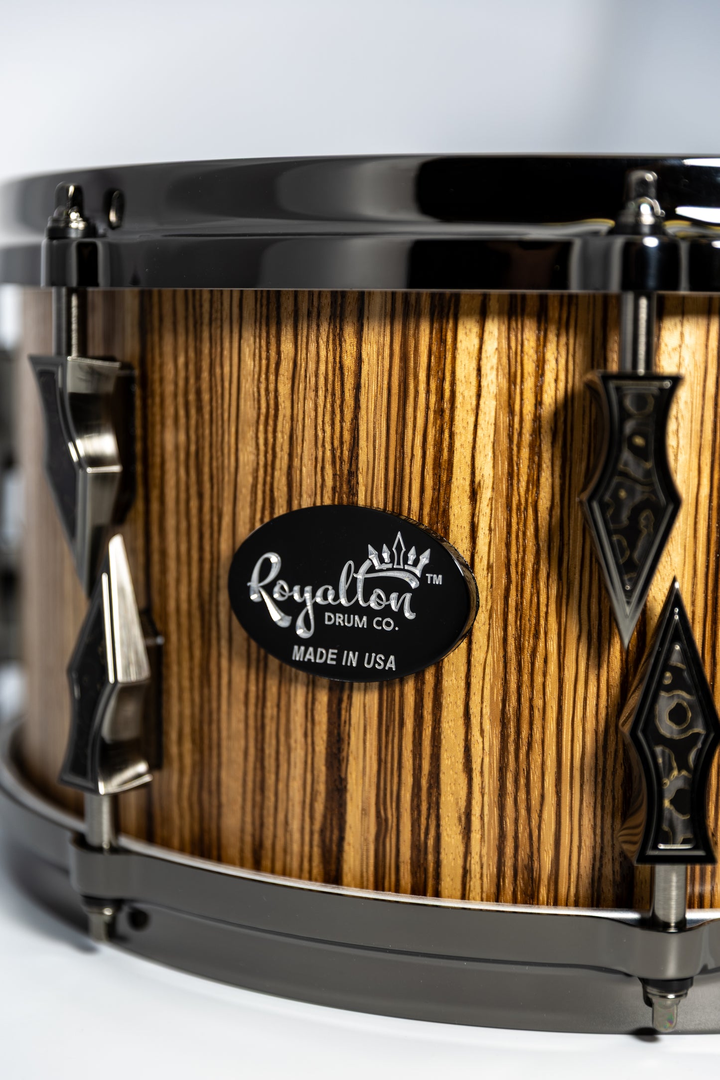 Hybrid Zebrawood and Maple 8 Lug Stave Snare Drum 7''x14'' Satin Finish with Custom Antique Brushed Black Nickel Lugs and Gold Camo Carbon Fiber Inlays